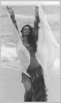 Kim posing on the beach