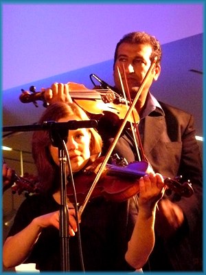 Hassan plays violin